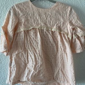 Light pink long bell sleeve blouse